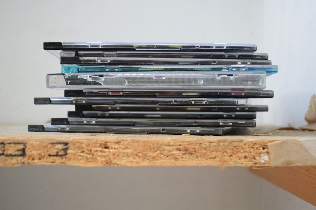 Shelves of archived videotapes and film reels in a media archive